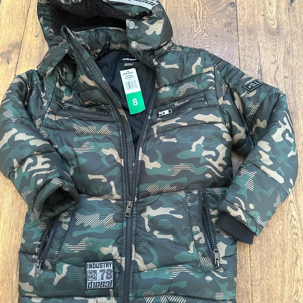 Diesel Jacket for 8 years old boy brand new with tags very warm soft and light